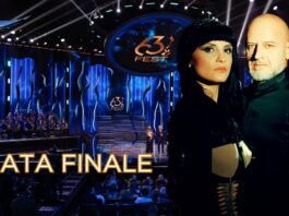 A dramatic stage setting with blue lights and an orchestra, featuring a man and woman in the foreground. The text "NATA FINALE" is prominent at the bottom.